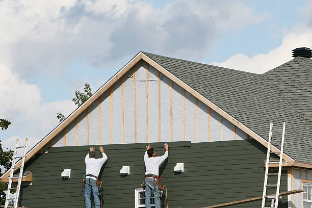 Professional Emergency Siding Repair technician working in Huntington, NY